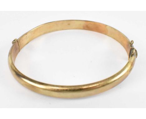 A 9ct yellow gold bangle (af), approz 8.4g.