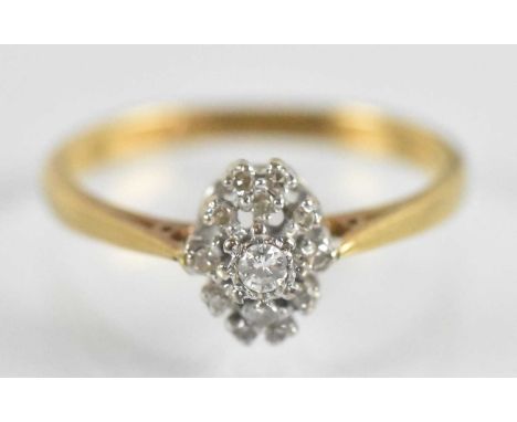 An 18ct yellow gold and platinum diamond set ring, size N, approx 3.3g.