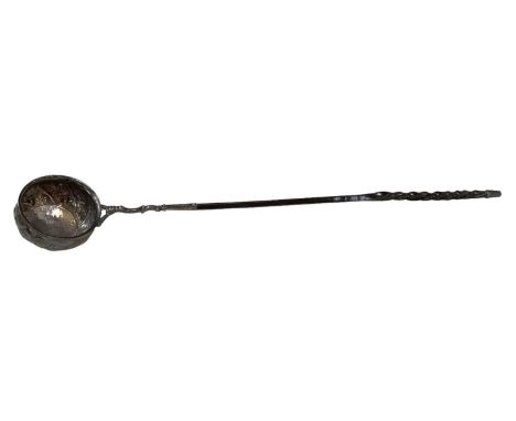 A George I white metal wine ladle, the bowl set with a 1726 half crown, length 37.5cm, diameter of bowl 5.5cm.