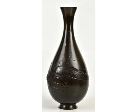 A Japanese Meiji period bronze vase of baluster form, decorated with koi carp to the body, bears signature to underside, heig
