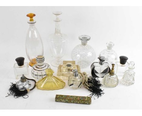 A collection of fifteen scent and perfume bottles including silver topped example, Art Deco example etc, height of tallest 28
