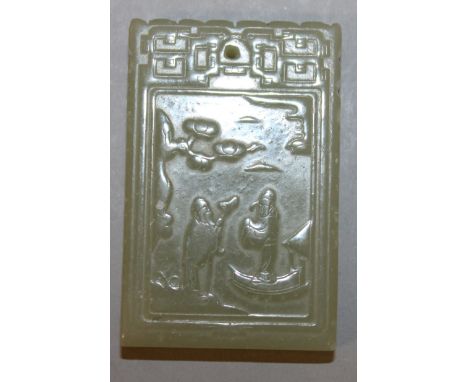 A CHINESE DARK CELADON GREEN JADE-LIKE PENDANT, decorated to one side with two sages, the reverse side with calligraphy, 2.25