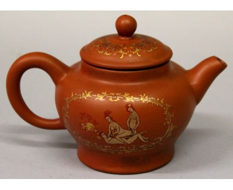 A 20TH CENTURY CHINESE EROTIC YIXING TEAPOT & COVER, the sides decorated in gilding with figural scenes between formal foliat