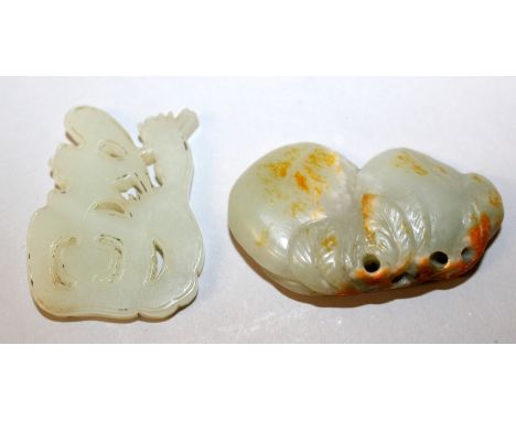 A 19TH/20TH CENTURY CHINESE PIERCED CELADON JADE CARVING IN THE FORM OF AN AUSPICIOUS CHARACTER, 1.8in x 1.4in at widest poin