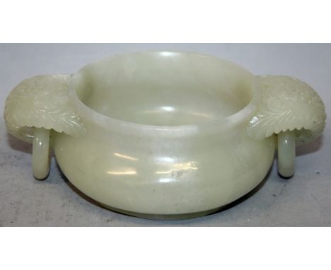 A GOOD QUALITY CHINESE JADE CENSER, with floral carved and loose ring handles, the stone of predominantly pale green tone, 6.