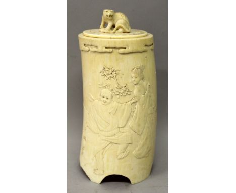 A SIGNED JAPANESE MEIJI PERIOD IVORY TUSK VASE & COVER, supported on a shaped foot, the sides of the slightly curved body car