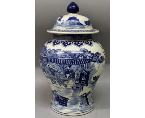 A CHINESE BLUE & WHITE PORCELAIN VASE & COVER, decorated with a continuous figural scene, the base with a Qianlong seal mark,