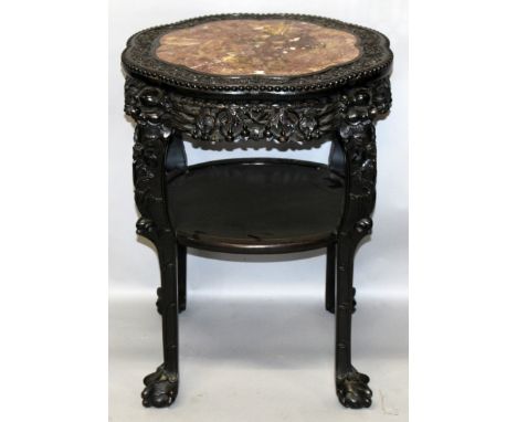 A LARGE GOOD QUALITY 19TH CENTURY CHINESE MARBLE TOP CARVED HARDWOOD STAND, the octofoil shaped top with a foliate scroll bor