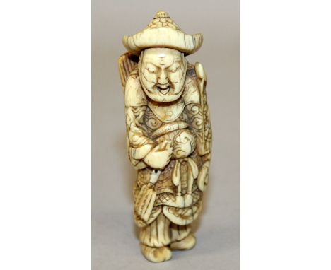 A FINE QUALITY EARLY 18TH CENTURY SIGNED JAPANESE EDO PERIOD IVORY NETSUKE OF AN ARCHER BY MITSUHARU, well carved, the robes 