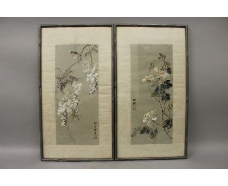 A PAIR OF 20TH CENTURY FRAMED CHINESE PAINTINGS ON PAPER, each painted with a flowering stem, each with an inscription and an