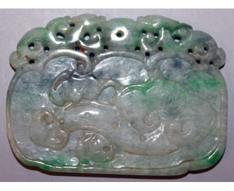 A CHINESE APPLE-GREEN JADE PENDANT, decorated to one side with a bat, the reverse side with lingzhi, beneath a pierced dragon