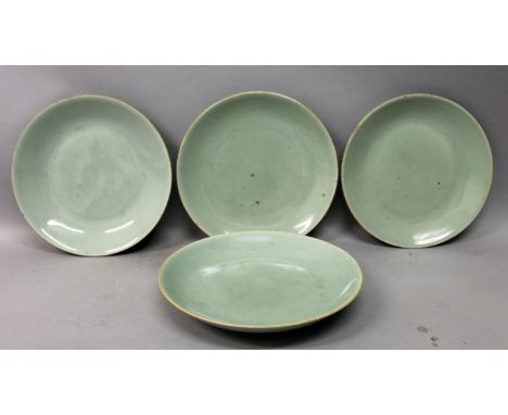 A GROUP OF FOUR 19TH CENTURY CHINESE CELADON PORCELAIN DISHES, circa 1840, each with an underglaze-blue seal marks and wax ex