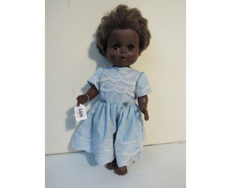 A Chiltern black doll 18in high, moving eyes 