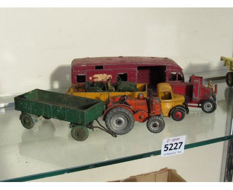 Five Dinky diecast vehicles including Bedford, Horsebox and Austin Champ and a Lesney combine harvester (6)