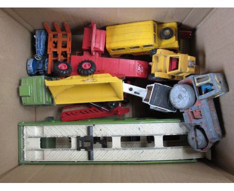 A box of diecast vehicles including Dinky roller 