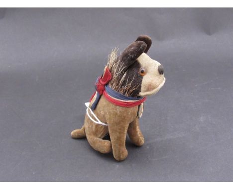 A 1928 Steiff "Bully" Bulldog with orange and black eyes, hair ruff, red, white and blue ribbon collar and original metal-rim
