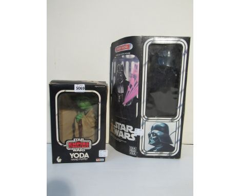 An Original Darth Vader large size action figure and Yoda hand puppet, boxed