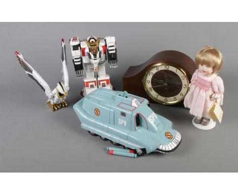 A quantity miscellaneous to include Power Rangers figures, Captain Scarlet SPV, Porcelain Doll and Woodford mantle clock.  