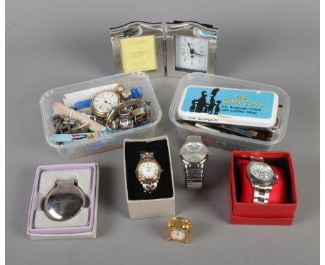 A quantity of assorted watches, clocks and watch straps. To include picture frame clock, Longines watch and Toy Story straps.