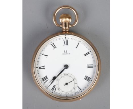 A yellow metal Omega pocket watch. With roman numeral markers.  Running. Light scratching to case.