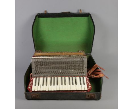 A cased Pietro accordion.  