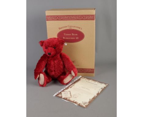 A boxed Steiff Burgundy 40 jointed bear with growler. No. 00398. Complete with original certificate of authenticity.  