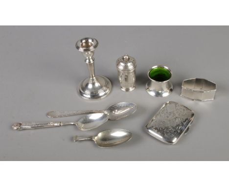 A quantity of silver including weighted candlestick (London 1904, 74g), cigarette case (Birmingham 1926, 41.5g), napkin ring 