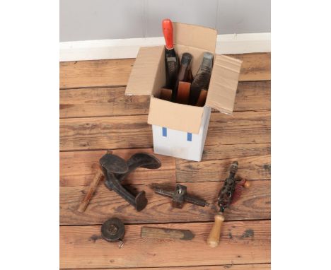 A box of assorted tools including flaring tool, spirit levels, tape measure, etc.  