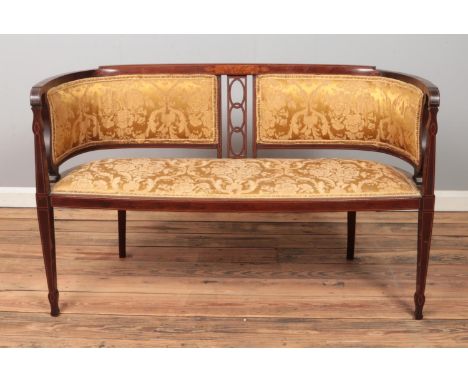 A mahogany parlour sofa, with floral upholstery. Height: 70cm, Width: 124cm, Depth: 53cm.  
