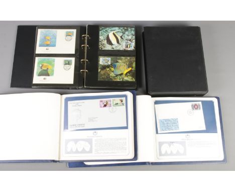 A WWF album of WWF first day covers along with two silver jubilee first day cover albums and contents.  