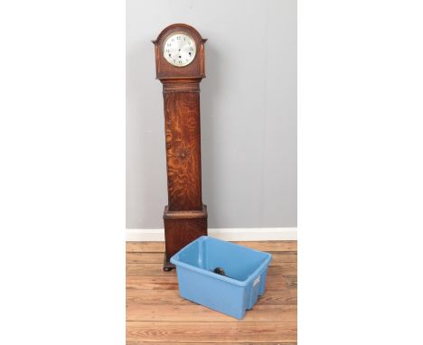 A German Kienzle grandmother clock featuring carved floral motif.  In need of restoration, all pieces present.