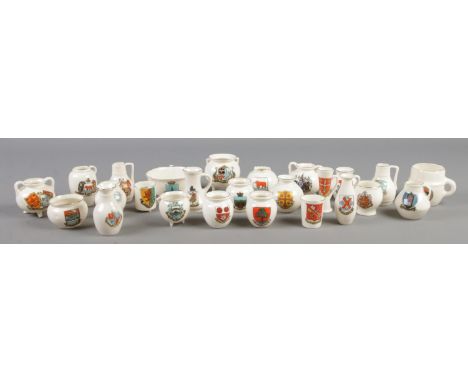 A tray containing twenty-five pieces of crested ware, mainly by W.H Goss. To include cauldron, bowl and twin handled urn exam