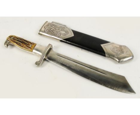 A German Third Reich R.A.D. service dagger with engraved scabbard, the blade stamped "RJAD" inside a triangle and "ED.Wustoph