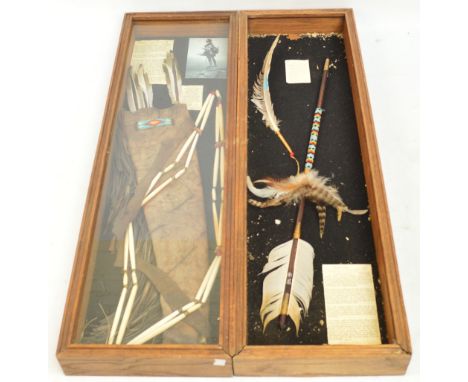 Two displays of Native American artifacts; one containing a fringed leather quiver decorated with a small beaded panel contai
