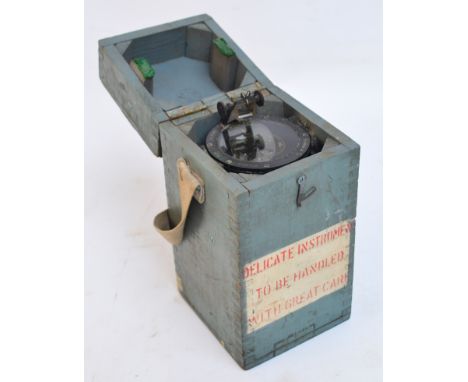 A vintage army compass with prism inscribed with military arrow "6A/1248 06A No47947.H." in wooden box.