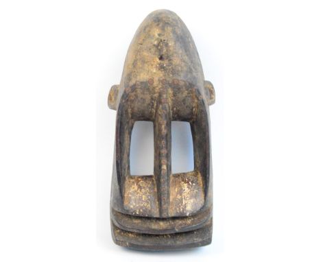 A Samana mask, Dogon, Mali, height 39cm, width 17cm, depth 16.5cm.

The mask is of abstract rhomboid form and has traces of p