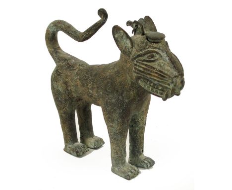 An 18th century Benin bronze model of a leopard with pivoting plug to the head and modelled four square, length 18cm, height 