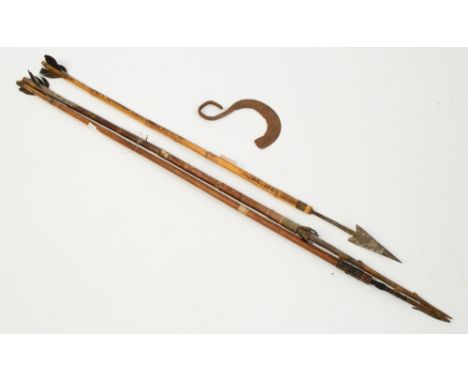 Three tribal arrows, two with bamboo shafts, Congolese, length 69cm to 60.5cm, also a small axe curved blade (4).