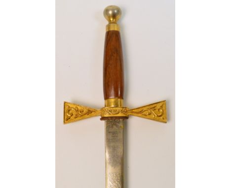 A decorative cross hilted sword with blade by Wilkinson acid etched with various motifs and figures, length of blade 75cm.