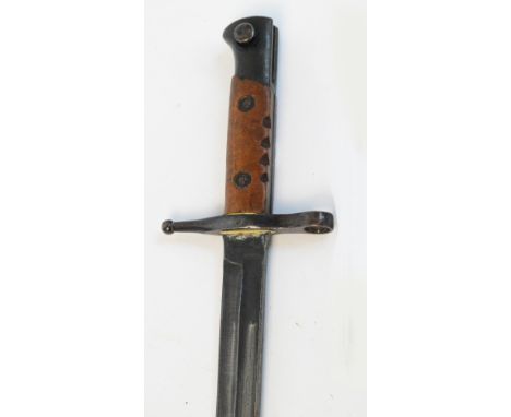 A WWI period bayonet with associated brass mounted leather scabbard, the blade stamped "Turni", the hilt stamped "PM5615", le