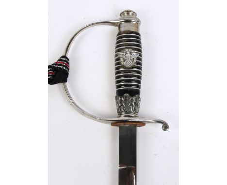 A German Third Reich police/fire service sword and scabbard, with police army insignia set to grip, the blade stamped "Pet.Da