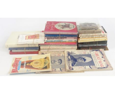 A collection of military reference books, including Imperial German Uniform, Third Reich, Bayonets, Home Guard training manua