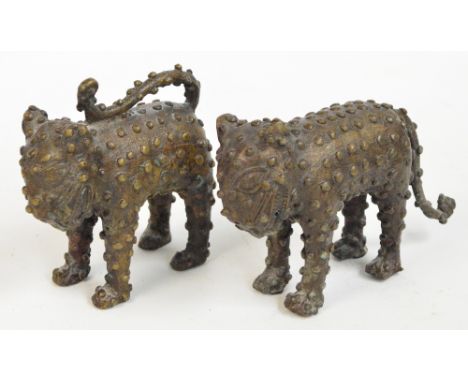 A pair od 20th century Cameroon bronze figures of standing leopards with "spotty" decoration, height 14cm.