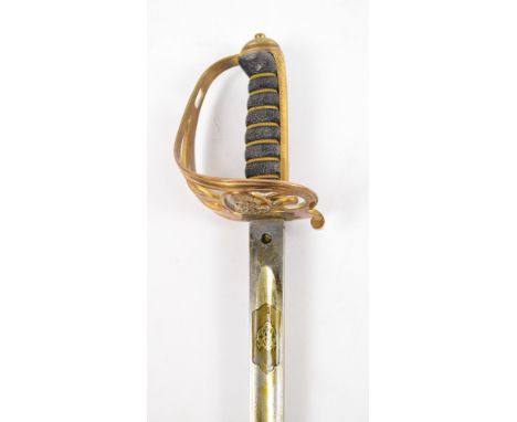 An Edward VII infantry officer's dress sword with acid etched blade, pierced knuckle guard, shagreen grip and leather scabbar