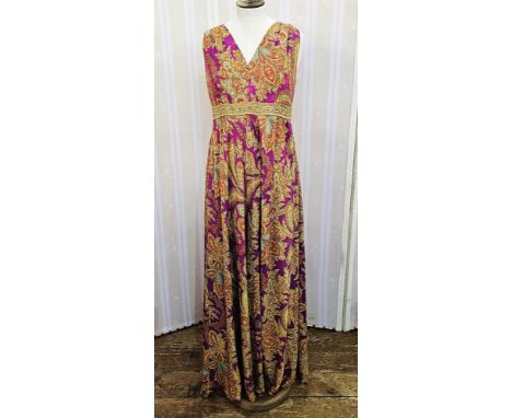 A printed paisley 1970's jump suit, trimmed with gold braid V neck, sleeveless, and a vintage tweed jacket, fall front (2)Con