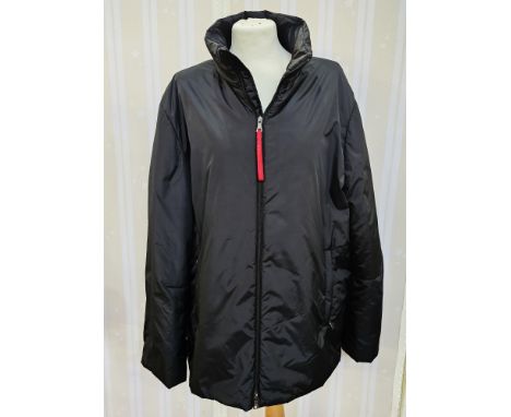 Prada puffa jacket, labelled 'Art.SGV293 Mat JZF', with red ribbon fastening to the zip, labelled 'Prada', side zip pockets a