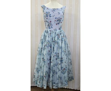 A 1950s nylon chiffon pale blue floral printed party dress, an evening gown, nylon chiffon ruched bodice, halter neck, side z