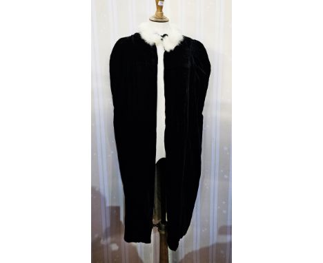 Vintage black velvet cloak&nbsp;lined with white coney, with a white coney collar and a small vintage black velvet cloak&nbsp