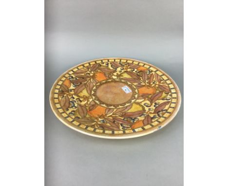 CHARLOTTE RHEAD CERAMIC CHARGER, 41cm diameter, along with six mugs decorated with Mackintosh style designs and a Leonardo co