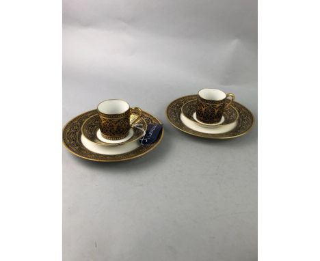 LIMOGES COFFEE SERVICE, with gilt, floral and scrolling decoration, comprising eight cups, saucers and side plates
